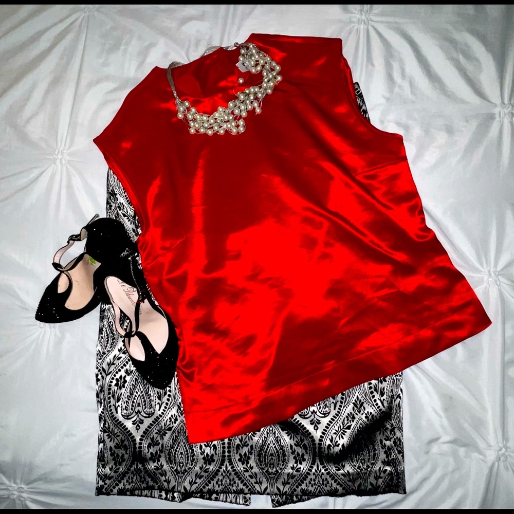 Red satin sleeveless blouse